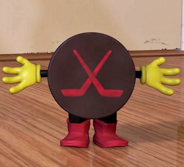 The minor character Hockey Puck from Toy Story, featuring a black puck body with crossed red hockey sticks, yellow hands, and red boots standing on a wooden floor.